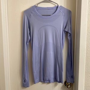 Lululemon workout top. It is the tight fitting shirt.